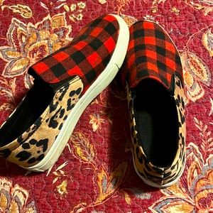Half cheetah print and half buffalo check sneakers. Only worn a few times.